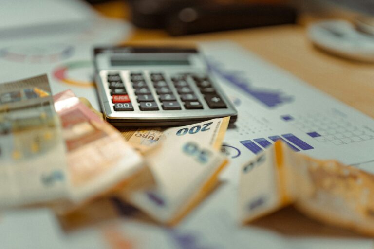Calculator and money on desk